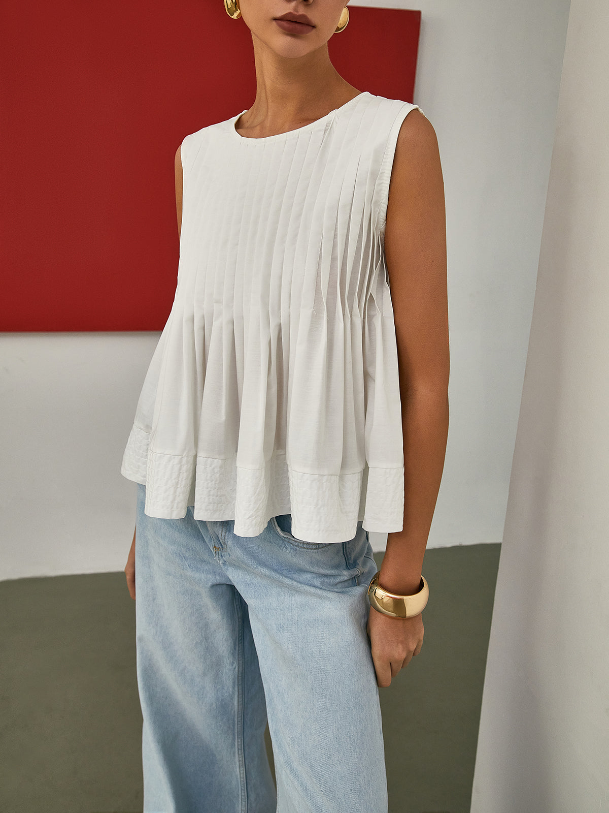 Petal Pleated Peplum Sleeveless Blouse