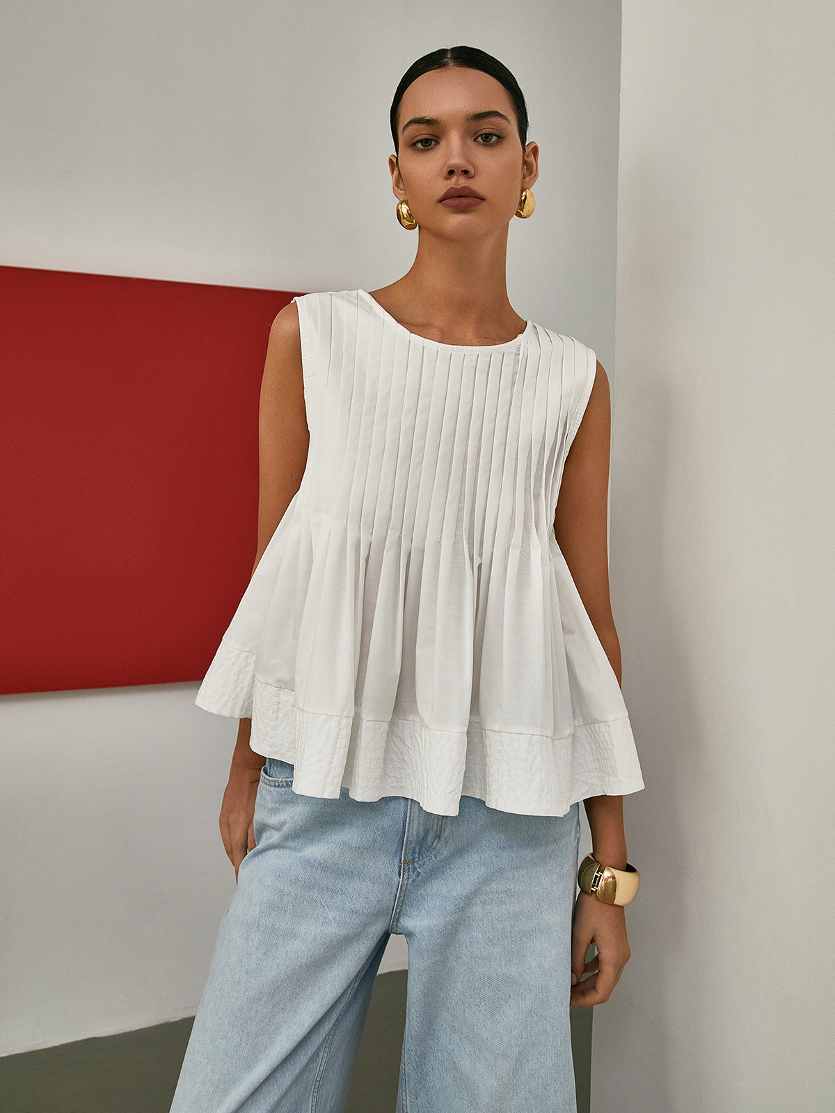 Petal Pleated Peplum Sleeveless Blouse