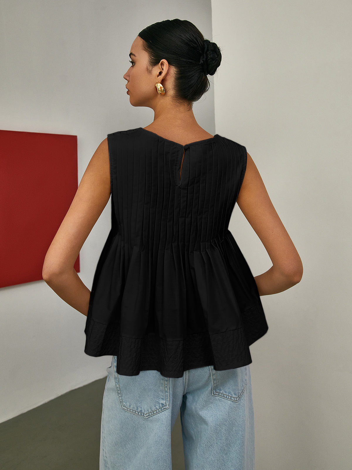 Petal Pleated Peplum Sleeveless Blouse