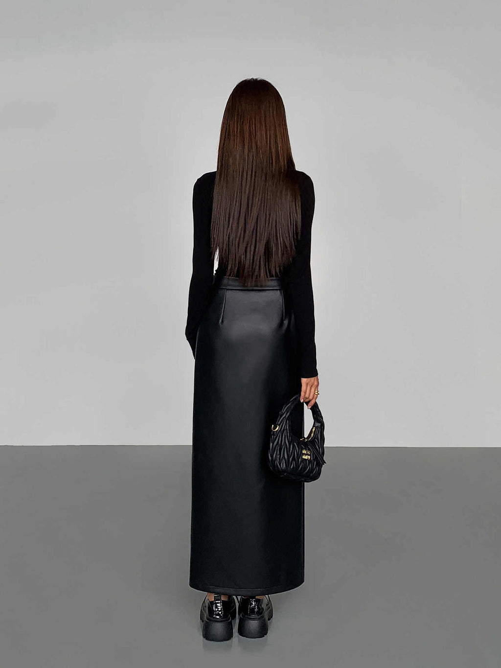 Uptown Split Faux Leather Midi Skirt