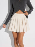 Poised Mid-Waist Pleated Mini Skirt