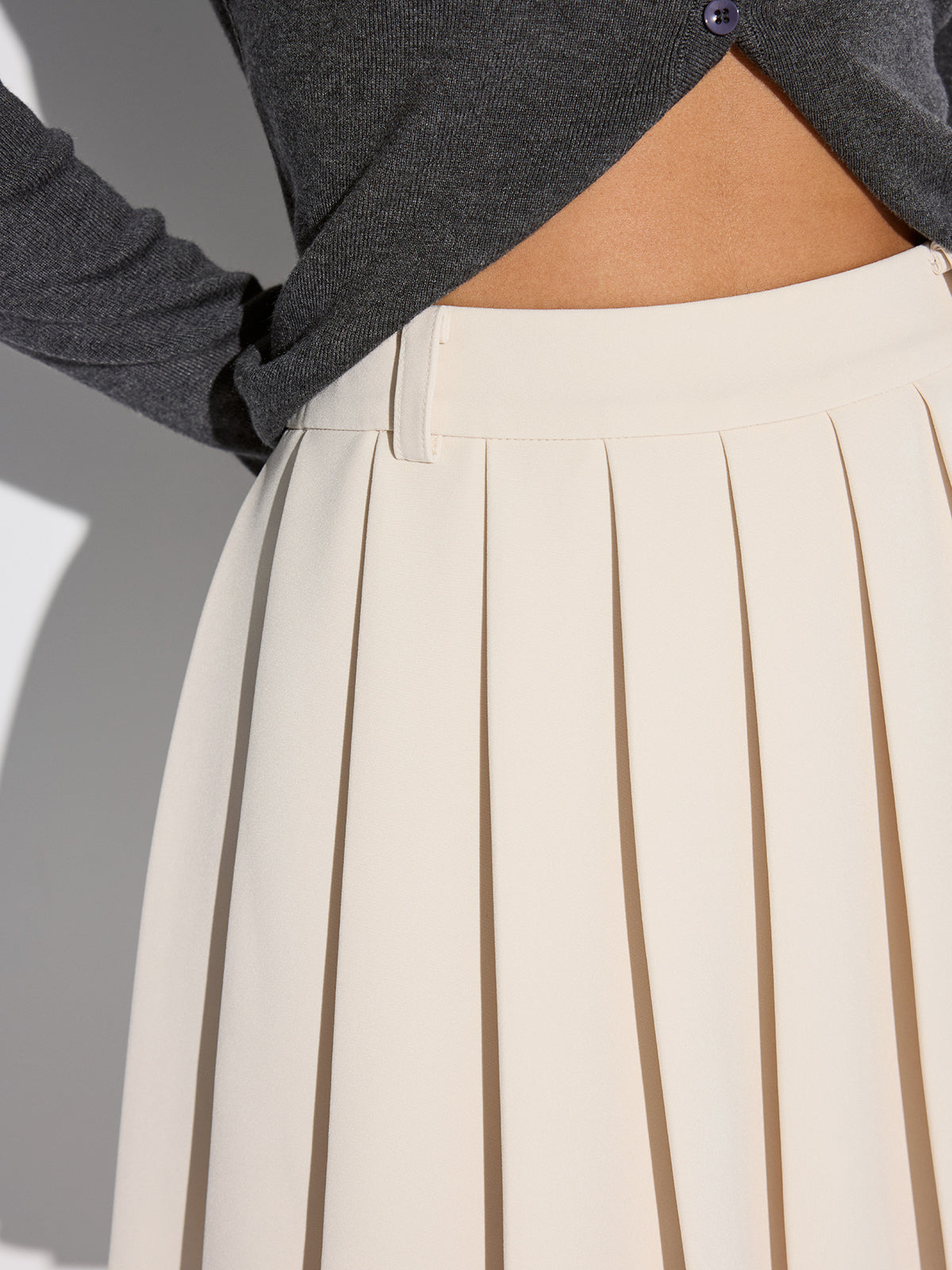 Poised Mid-Waist Pleated Mini Skirt