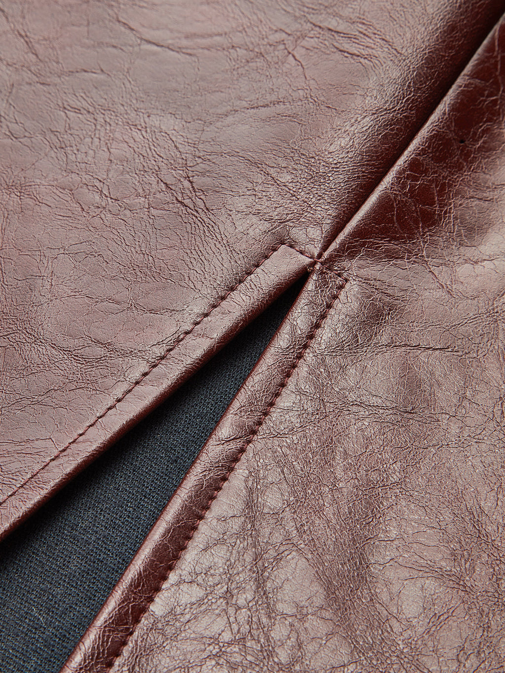 The Vixen Slit Faux Leather Knot-Detail Midi Skirt