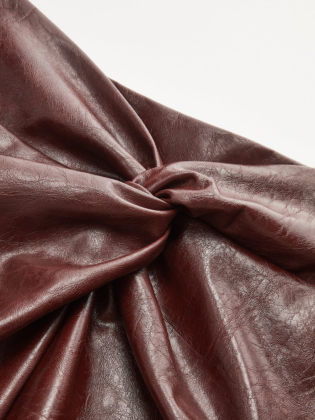 The Vixen Slit Faux Leather Knot-Detail Midi Skirt