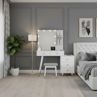 Vanity set with bed on opposite side